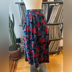 Size 8 A-line velvety, soft, bright rose skirt with pockets. 50s style